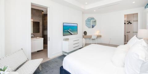 This image shows a modern and well-lit bedroom
