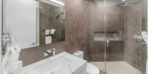 This image shows a modern bathroom interior featuring neutral tones
