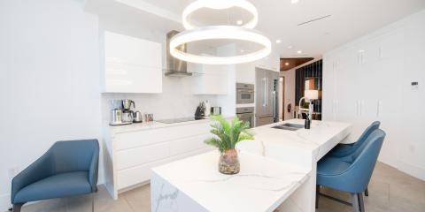 The image shows a modern, elegant kitchen
