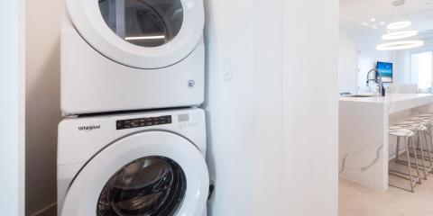 The image shows an interior scene with modern appliances and furnishings