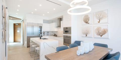 This image features a modern kitchen and dining area