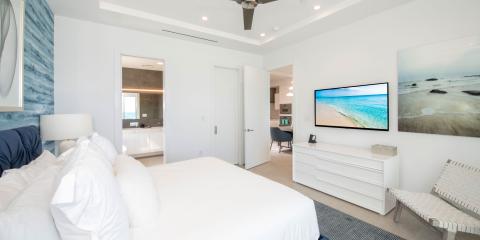 This image showcases a modern and brightly lit bedroom