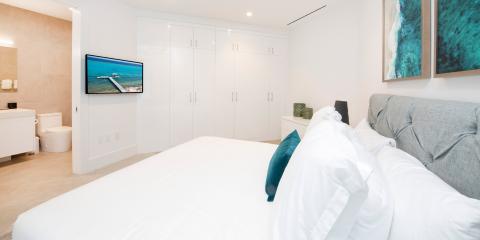 This image shows a modern and minimalistic bedroom design