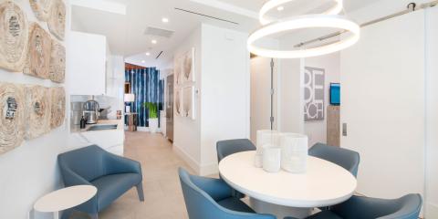 This is an image of a modern and sleek interior space, likely designed for relaxation or waiting