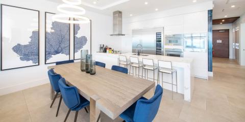 The image shows a modern kitchen and dining area