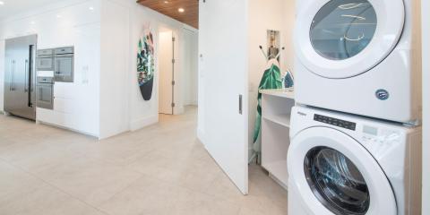 This image showcases a modern interior with kitchen and laundry facilities