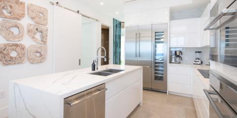 This image shows a modern kitchen interior featuring a clean, minimalist design