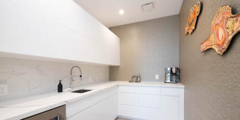 The image depicts a modern kitchen with a minimalist design