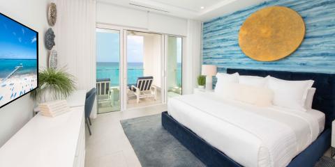 This image shows a beautifully decorated coastal-themed bedroom