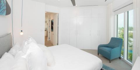 This image shows a modern and minimalist bedroom