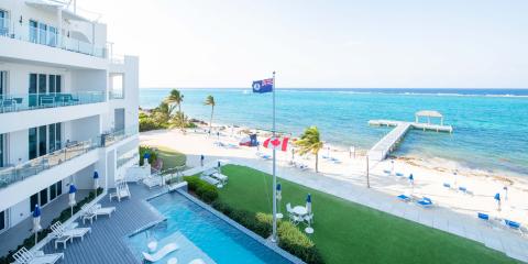 This image shows a beachfront resort view with a clear and vibrant setting