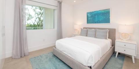 The image shows a modern and neatly decorated bedroom