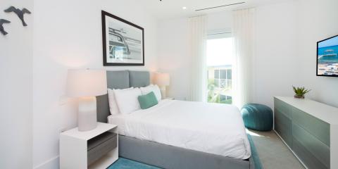 This image depicts a modern and neatly decorated bedroom