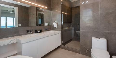 This image shows a modern bathroom interior with a luxurious design