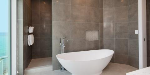 This image shows a modern bathroom with a spacious layout