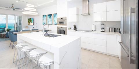 This image features a modern kitchen with a sleek design