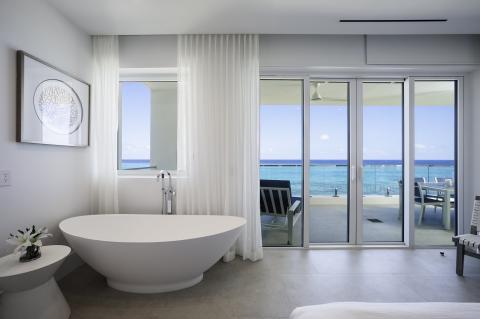 This image features a luxurious bathroom with contemporary design elements