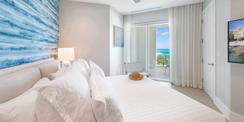 This image features a modern and elegantly decorated bedroom