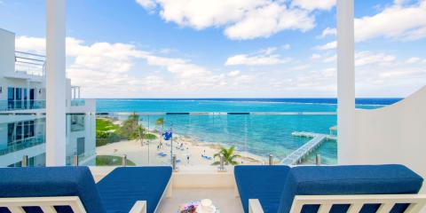 This image captures a beautiful beachside view from a balcony