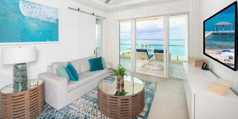 This image depicts a modern, coastal-themed living room