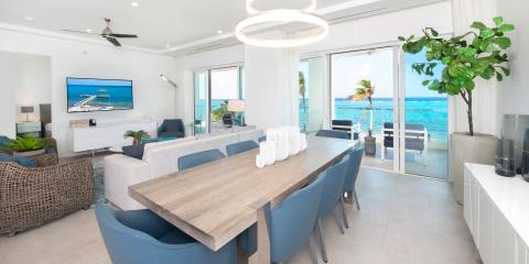 This image showcases a modern, stylish interior of a beachfront property