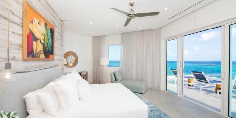 This image shows a modern and luxurious bedroom