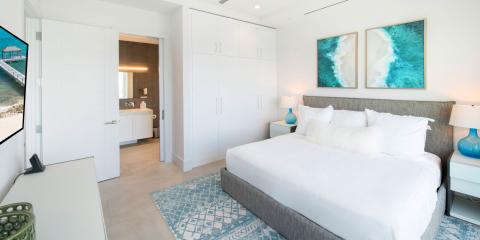 This image shows a modern and sophisticated bedroom