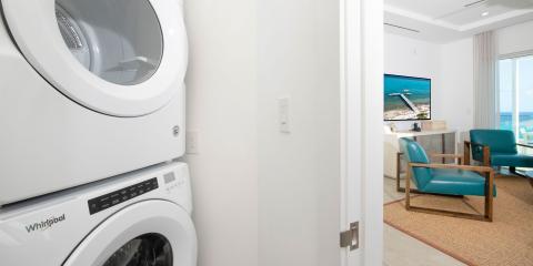 This image shows the interiors of a modern living space that is divided into two functional areas