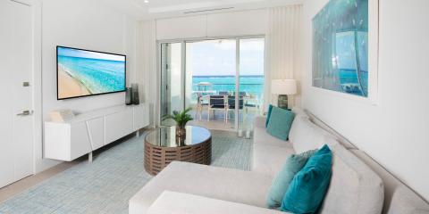 This is an image of a bright and airy beachfront living room