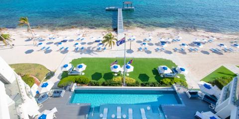 The image displays a luxurious seaside resort view