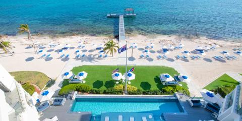 This image features a luxurious beach resort setting