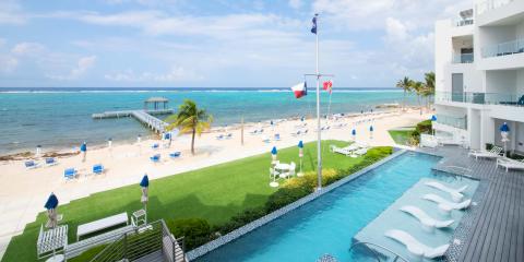 This image showcases a luxurious beachfront property with several amenities