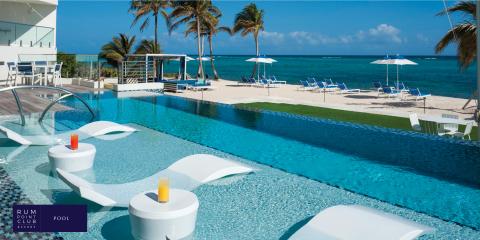 This image shows a luxurious beachside resort setting