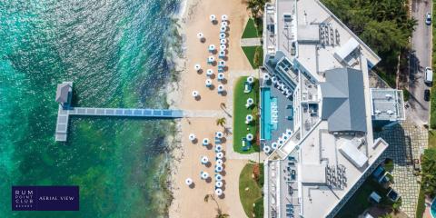 This image shows an aerial view of a beachfront resort