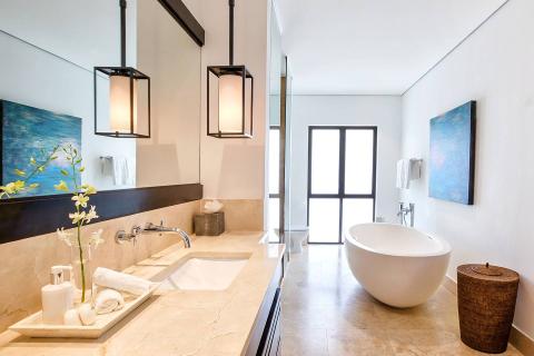 This image shows a modern bathroom with an elegant design