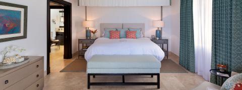 This image depicts a stylish and well-appointed bedroom