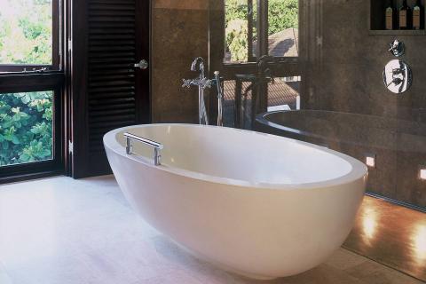 This image displays a luxurious bathroom setting