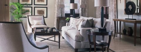 The image depicts a well-appointed living room in a contemporary style