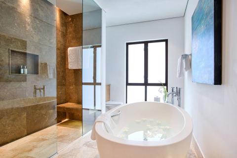 The image shows a modern and luxurious bathroom