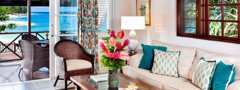 The image showcases an inviting beachfront living space