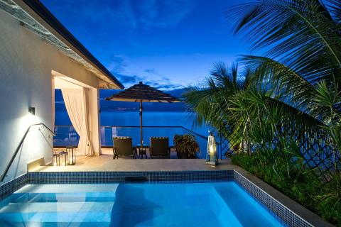 This image showcases a luxurious outdoor setting during twilight