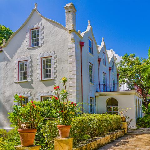 The image shows a charming, picturesque building with unique architectural features