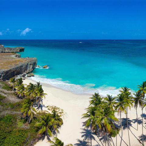 This image displays a beautiful tropical beach scene