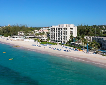 This image displays a picturesque tropical beach scene