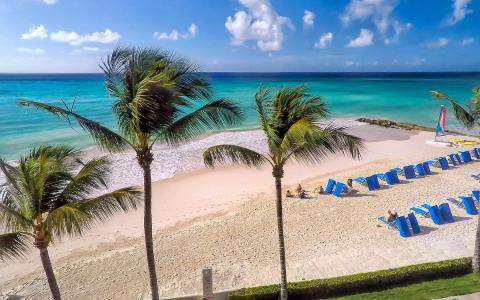 This image displays a beautiful tropical beach scene