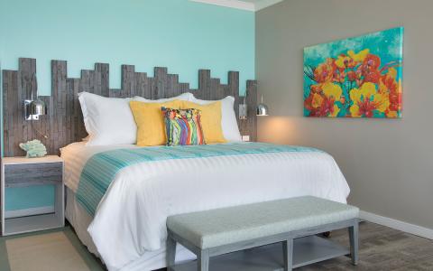 The image shows a beautifully decorated bedroom