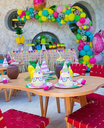 This image shows a vibrant and colorful party setup, possibly for a birthday or another festive celebration