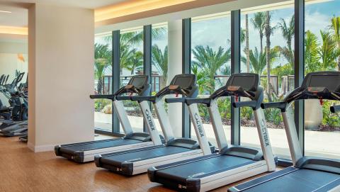 This image shows the interior of a modern and well-equipped fitness center