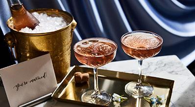 The image features a stylishly presented drinks setup