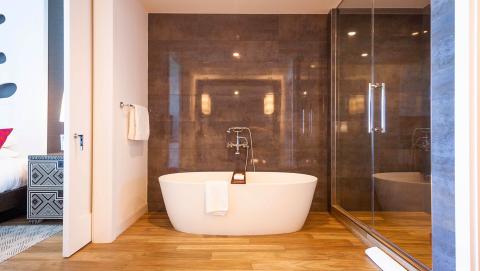 The image displays a luxurious bathroom